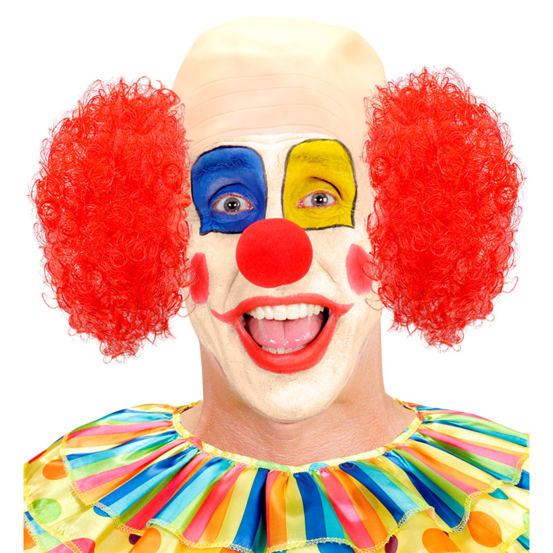 Klaun s holou hlavou a červenými vlasmi